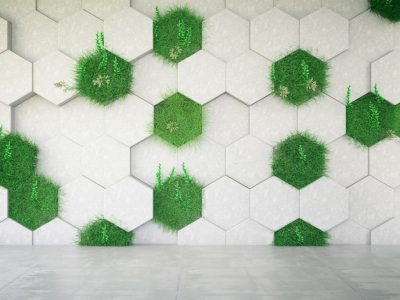 Concrete geometric wall with grass. 3D Render
